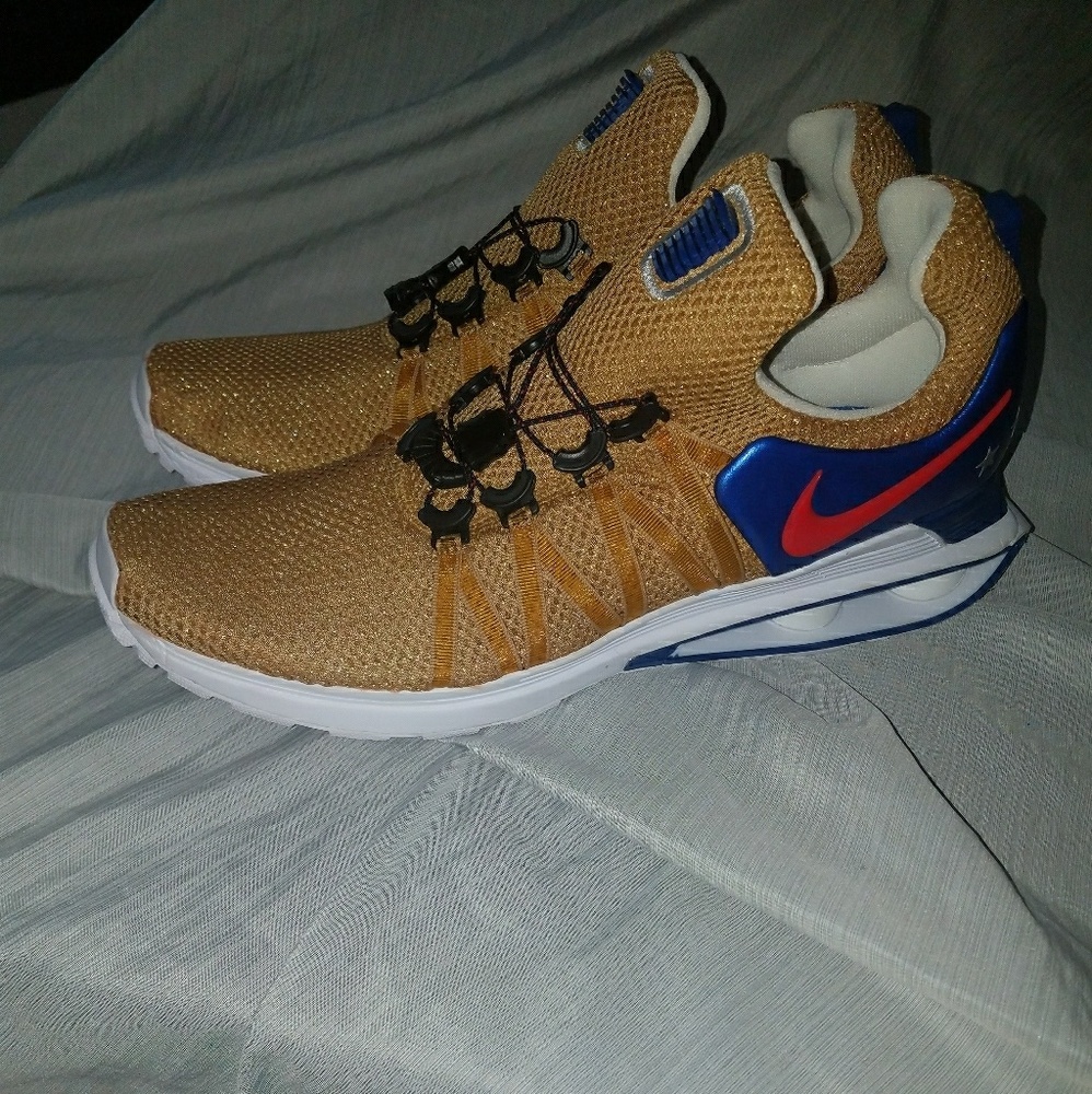 Mens Nike Shox Gravity Metalic Gold/Red/Blue size